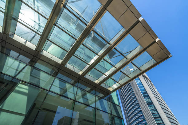 istock glass architecture of modern building 1401082639