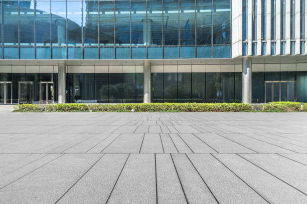 empty brick floor with modern buildings - main street imagens e fotografias de stock