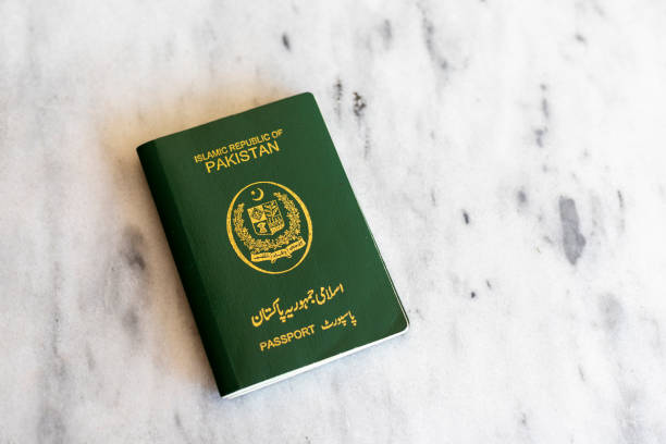 istock Pakistani green passport on white marble isolated background 1401083930