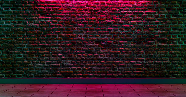 istock Brick wall with copy space and walking street and lighting on wall 1401092902
