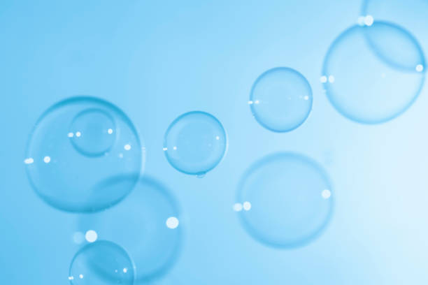 istock Abstract Beautiful Transparent Blue Soap Bubbles Background. Soap Sud Bubbles Water 1401093809