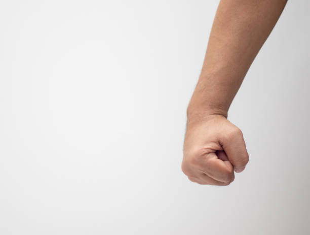 istock Concept of a man's hand clenched in anger 1401093898