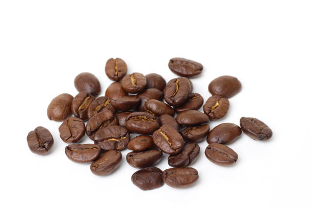 istock Roasted coffee beans isolated on white, brown roasted coffee bean 1401098754