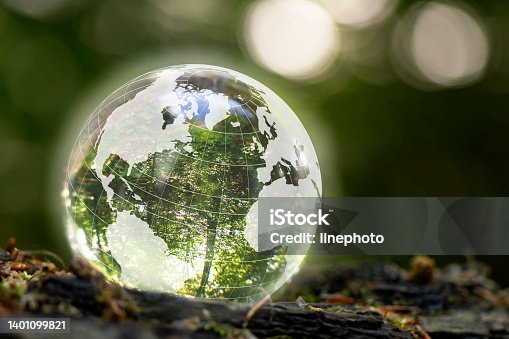 istock Globe in nature with nature inside. An illustration that shows how we should take care of nature 1401099821