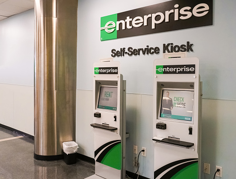 Miami, USA - April 22, 2022: Car rent self-service kiosk Enterprise