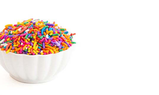 Bright Rainbow Sprinkles Isolated on a White Background