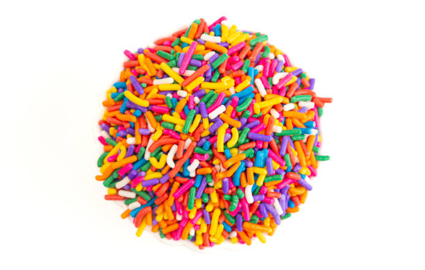 istock Rainbow Sprinkles Isolated on a White Background 1401103923