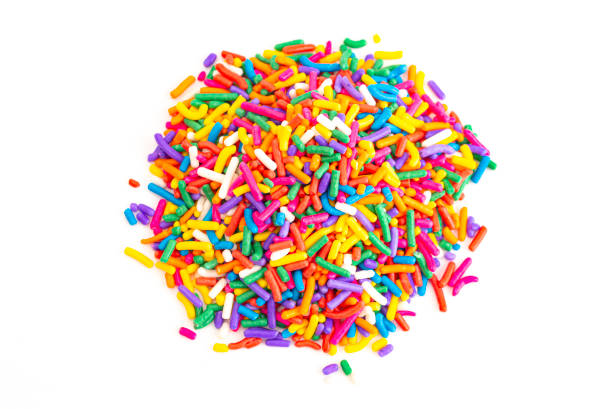 istock Rainbow Sprinkles Isolated on a White Background 1401103963