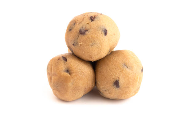 Raw Chocolate Chip Cookie Dough Isolated on a White Background stock photo