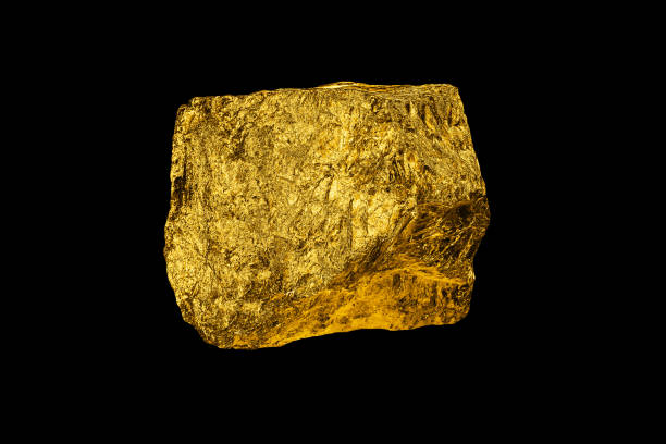 istock Golden stone isolated on black background. 1401106135