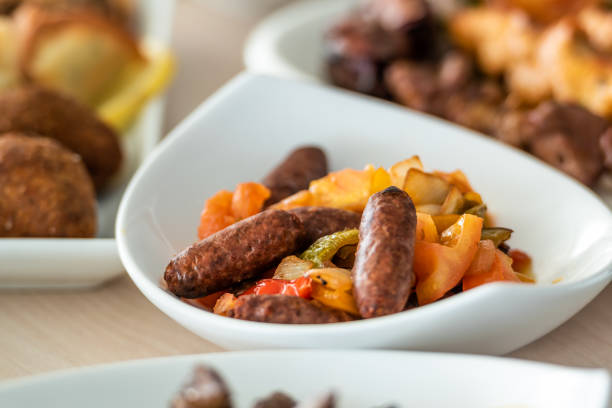 Delicious Sausages Called Makanek cooked in a plate, a traditional Lebanese and Armenian dish