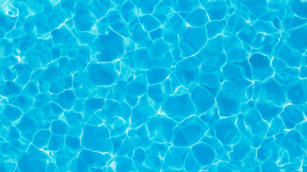 Swimming Pool From Above - Reflecting Water Surface On A Sunny Day - Summer, Caustics, Liquid stock photo