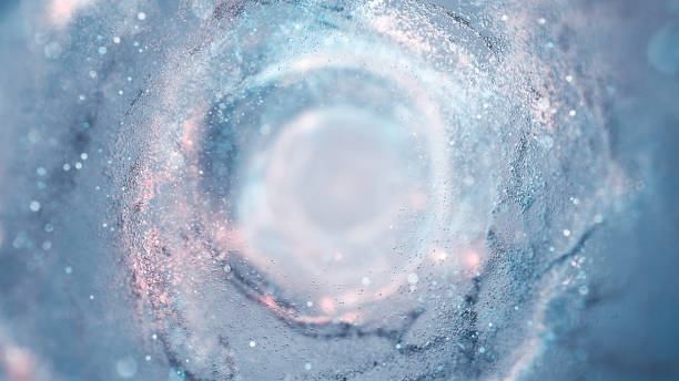 remolino de partículas brillantes: agua, hielo, nieve, fondo abstracto - water flowing water pouring ice fotografías e imágenes de stock