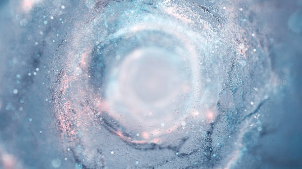 glittering particle swirl - water, ice, snow, abstract background - vloeistof fotos stockfoto's en -beelden