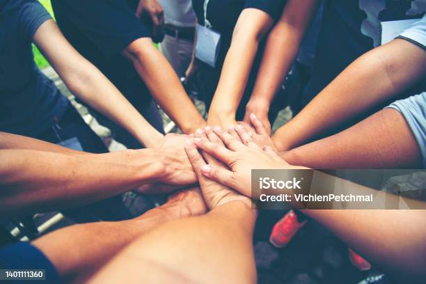 Teamwork Hands Of Spirit Team Working Together Outdoor Unity Strong Handshake With People Or Agreement Of Feeling Or Happy Diverse Education Action Stock Photo - Download Image Now