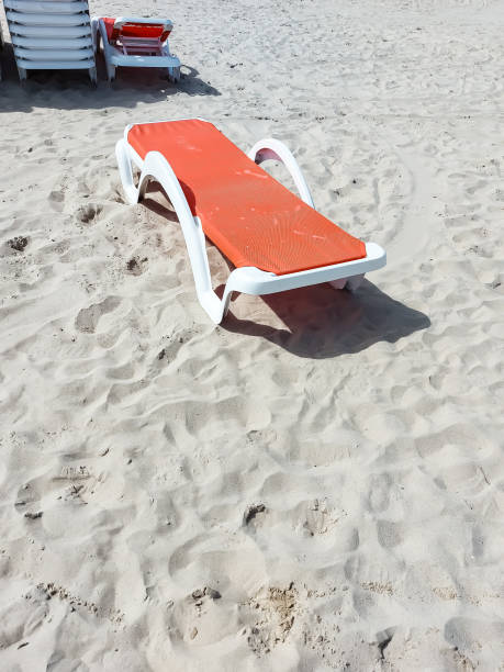 istock An abandoned sun lounger on the beach 1401114330