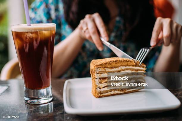 Eating Honey Cake And Ice Americano On A Hot Sunny Day Stock Photo - Download Image Now