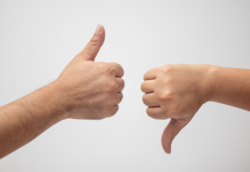 thumbs up and thumbs down white background