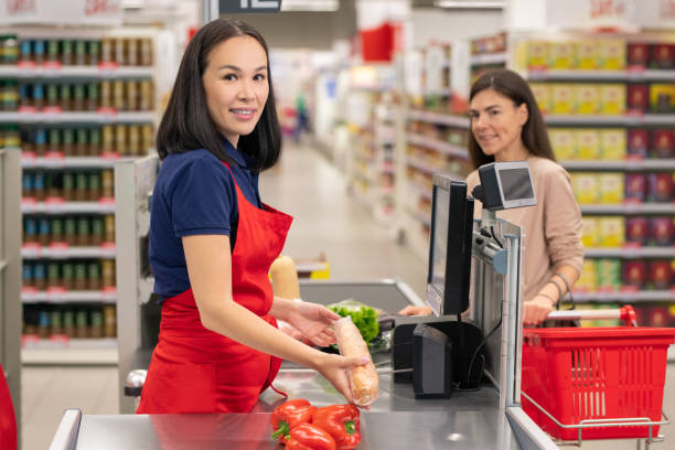 istock Beautiful Asian Cashier Working 1401120290