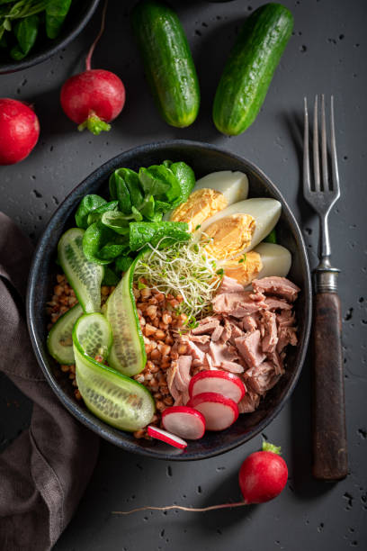 istock Healthy Nicoise salad with eggs, groats and tuna. 1401120320