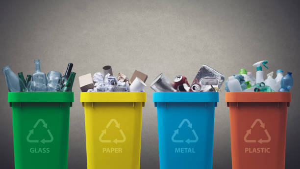 istock Collection of recycling bins with different types of waste 1401122875