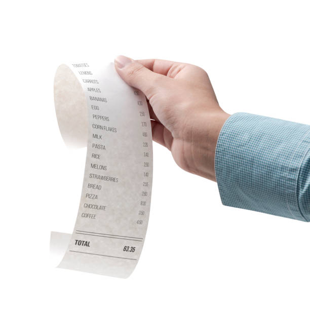 istock Woman checking a grocery receipt 1401123005