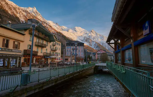 A landscape of Chamonix-Mont-Blanc town at sunset with Mont-Blanc mountain and the Alps in the background, France
