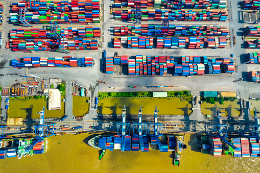 Aerial view of Cat Lai port with cargo ship and container Ho chi Minh city, Vietnam. The port is an important hub for import and export of important goods in Ho Chi Minh City
