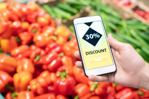 istock Checking Discount On Smartphone 1401126999