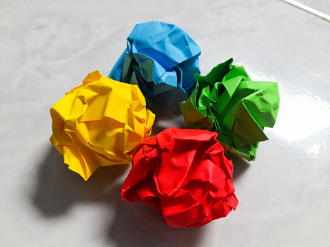 An origami paper consisting of four colors look crumpled but is very aesthetic