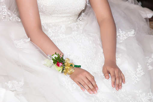 bride and her hands with bouquet