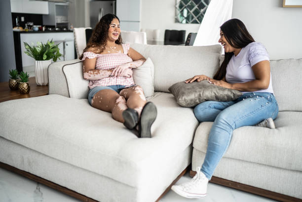 istock Friends talking at home 1401136800