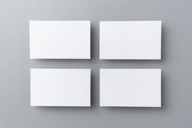 four business card isolated on grey background