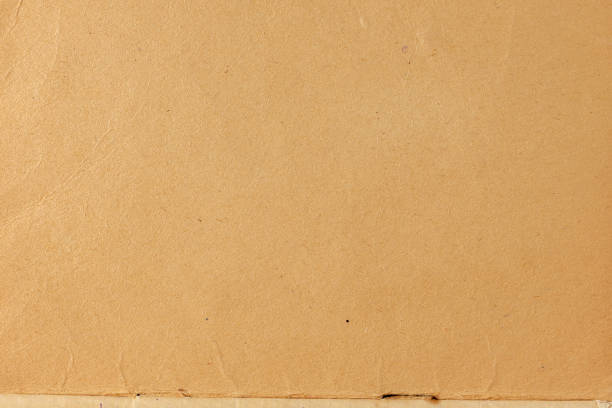 old yellowed paper texture Old yellowed paper as background. Blank page of vintage notebook yellowed edges stock pictures, royalty-free photos & images