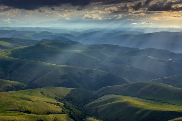 istock Sunbeams on hills in Caucasus mountains 1401143414
