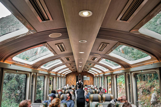 Train car with tourists from Cusco to Machu Picchu. stock photo