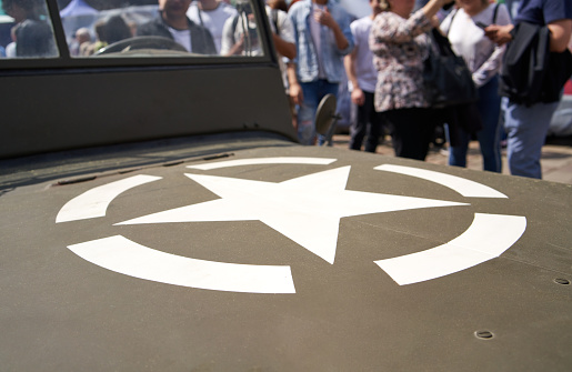 White star as symbol of U.S. Army on a vintage American vehicle - celebration of liberation of Pilsen, Czechia in 1945