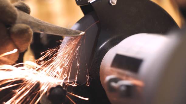 istock Sharpening the blade of an iron knife 1401157475