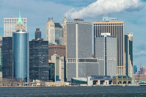Panoramic view of Lower Manhattan from a ferry boat on the Hudson River, New York, USA.