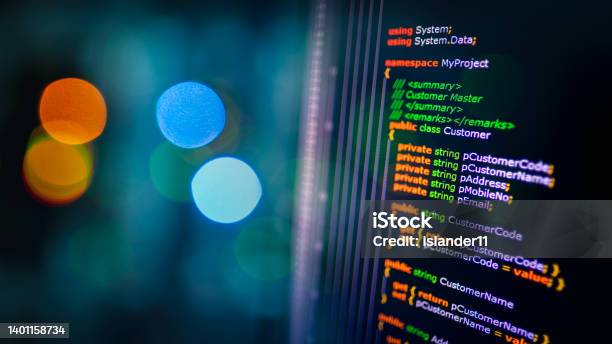 C Sharp Programming Language Source Code Example On Monitor And Bokeh Background C Source Code Stock Photo - Download Image Now