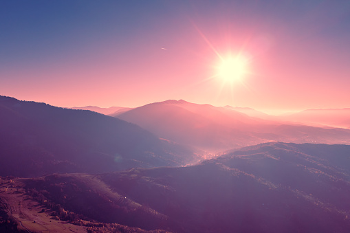 Sunrise over the mountains in trendy Velvet Violet color. Carpathian mountains, Ukraine