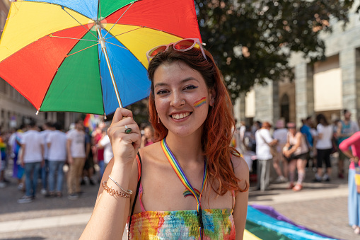 CREMONA, ITALY - JUNE 2022: Gay Pride Parade. People flock to the streets in demonstrations to celebrate, empower lgbtq, human and civil rights, gender diversity. First event in Cremona.