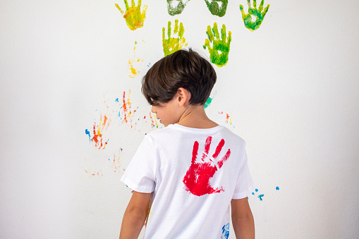 Boy Showing Colorful Paint on His Hands