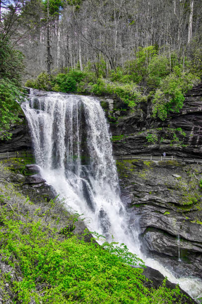 istock A scenic waterfall roadside going over the cliff down to the boulders and rocks below where you can no longer drive under but can walk underneath the raging waters 1401164222