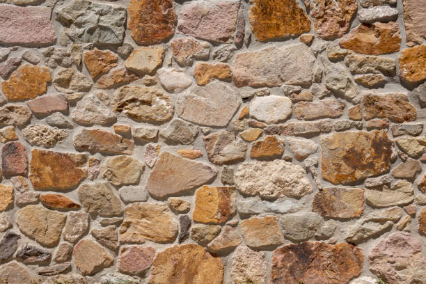 текстура каменной стены - paving stone stone brick wall стоковые фото и изображения