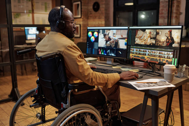 istock Colorist with disability editing photo on computer 1401165356