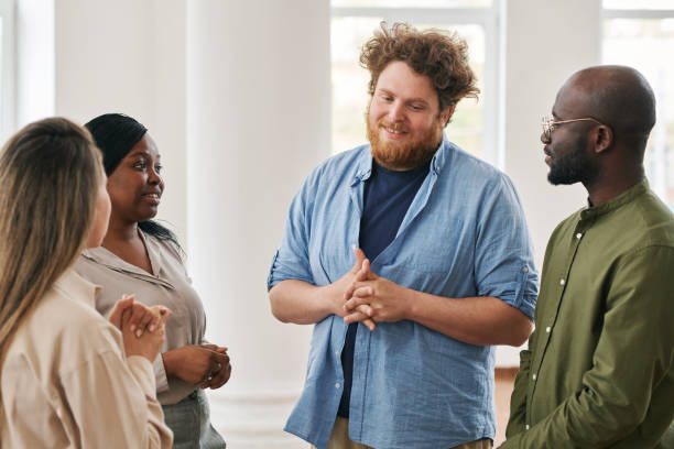 istock Group of intercultural people discussing their worries and other problems 1401166694