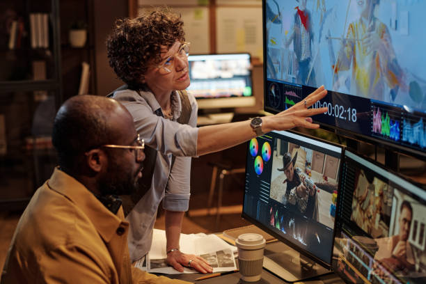 istock Project manager giving instructions to designer 1401167104