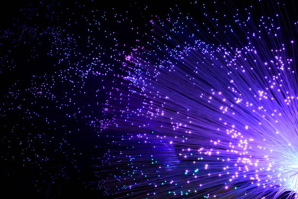 fiber optic purple light source. abstract background stock photo