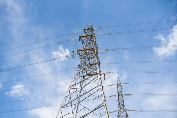 istock Electric power transmission tower high voltage line 1401167250